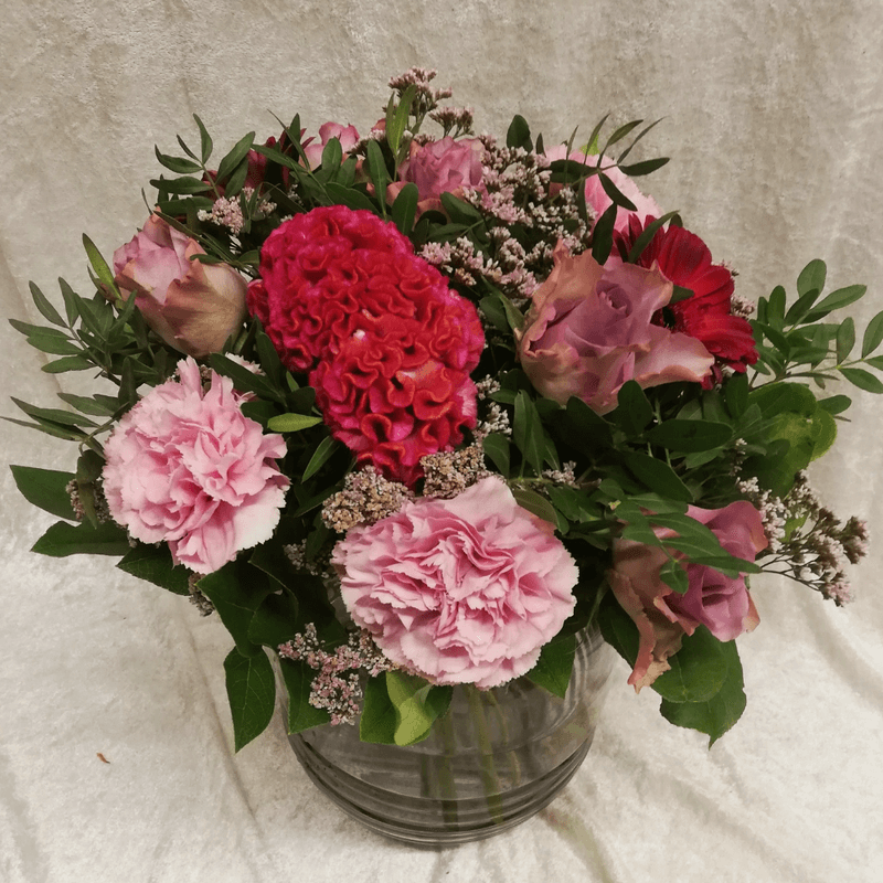 Bukett i lilla og rosa toner