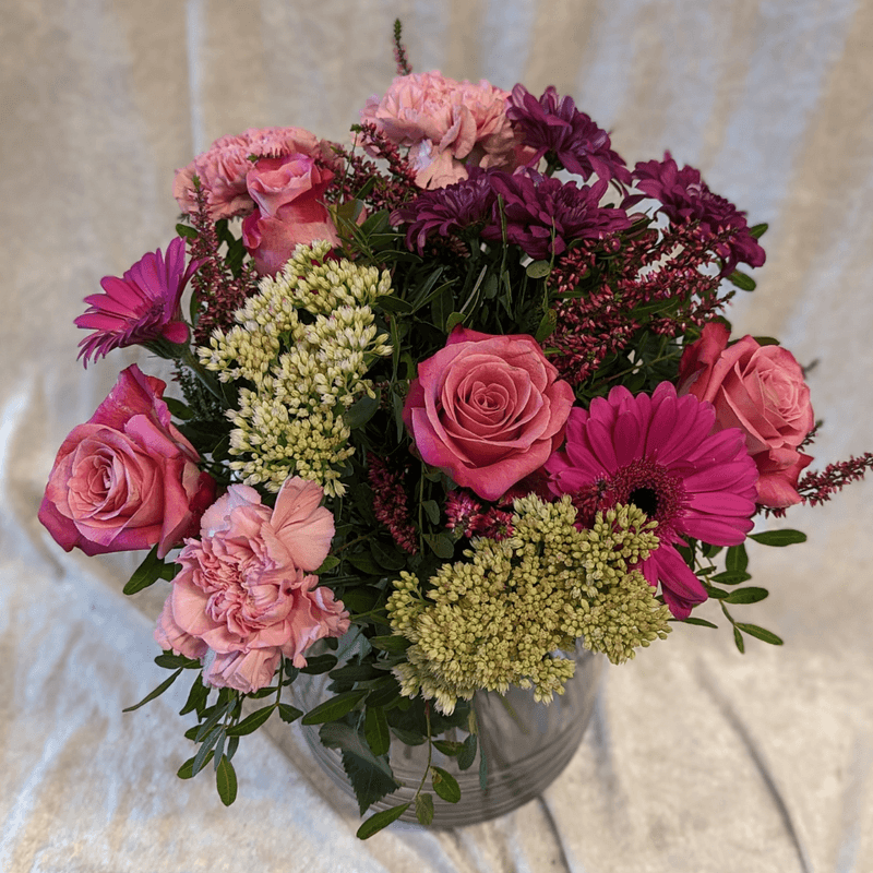 Bukett i lilla og rosa toner